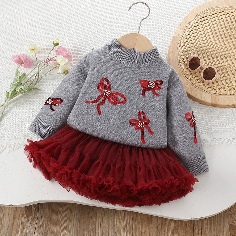 Conjunto Infantil Suéter Lacinhos e Sainha