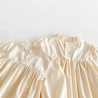 Body/ Vestido Infantil Bege Bordadinho