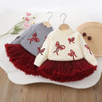 Conjunto Infantil Suéter Lacinhos e Sainha