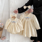 Body/ Vestido Infantil Bege Bordadinho