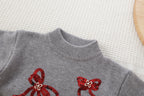 Conjunto Infantil Suéter Lacinhos e Sainha