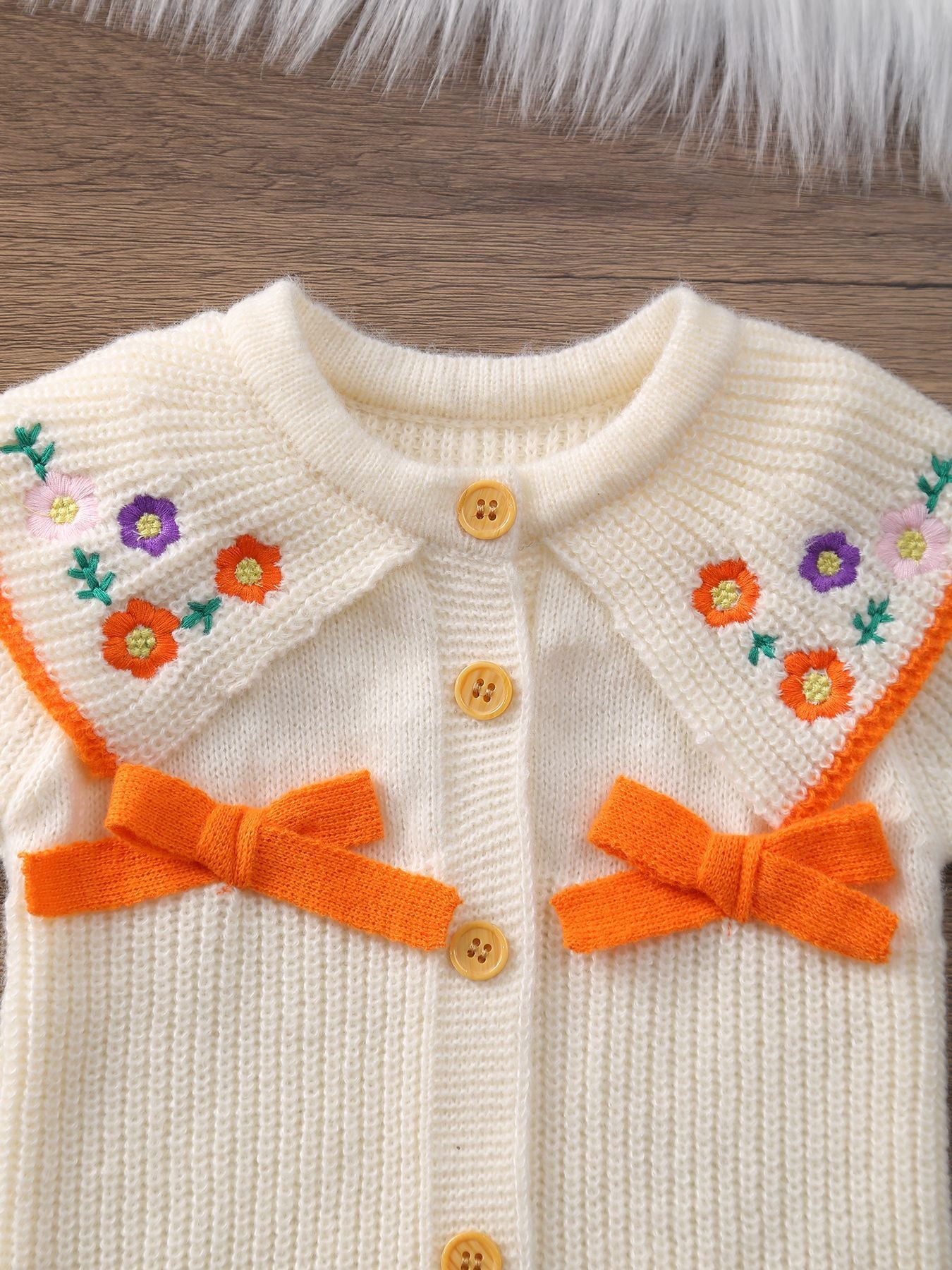 Macacão Infantil Tricô Florzinhas Lacinhos